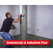 drywall worker using the adjstable multi-trowel on a column in a commercial construction setting